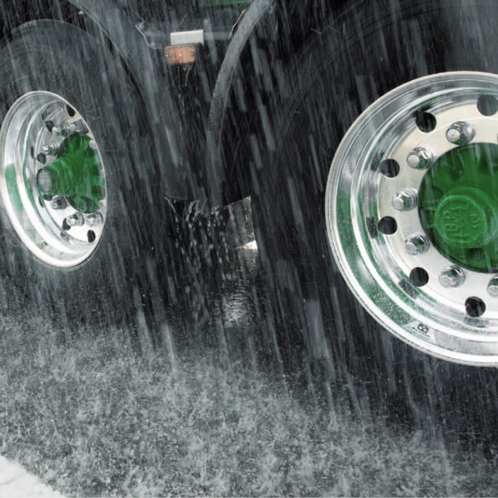 Two Alcoa Dura-Bright Wheels in the rain.