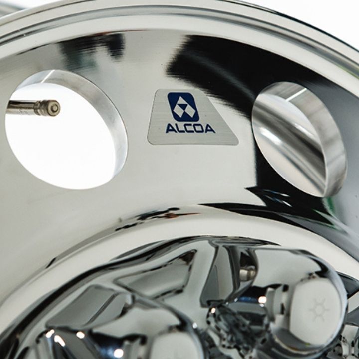 Closeup of a highly reflective aluminium truck wheel Mirror Polished Alcoa Wheel closeup