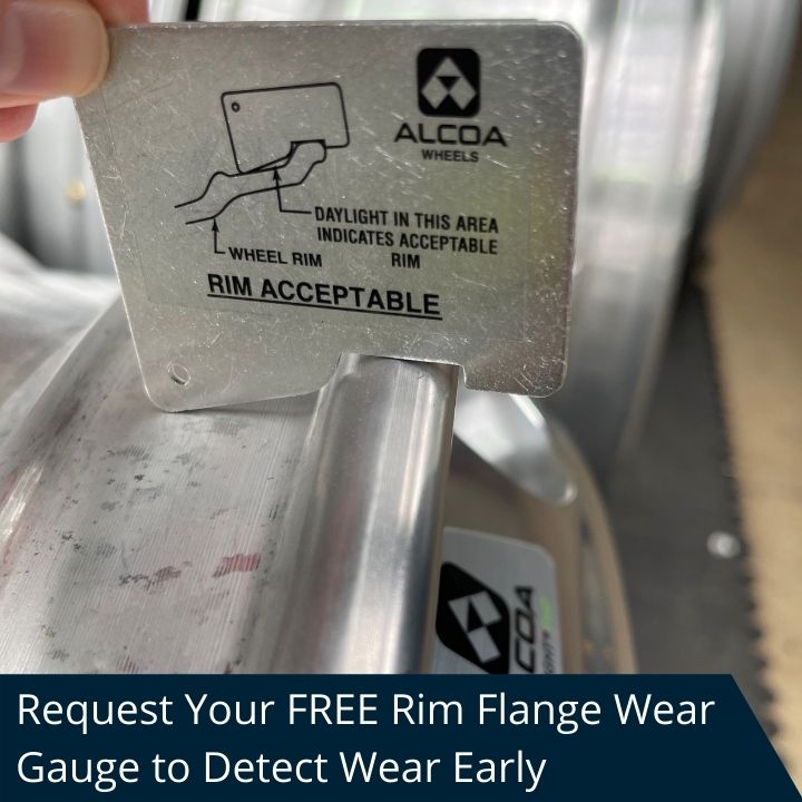 Close up of an Alcoa Wheels aluminium Rim Flange Wear Gauge being held against a Dura-Bright wheel rim flange